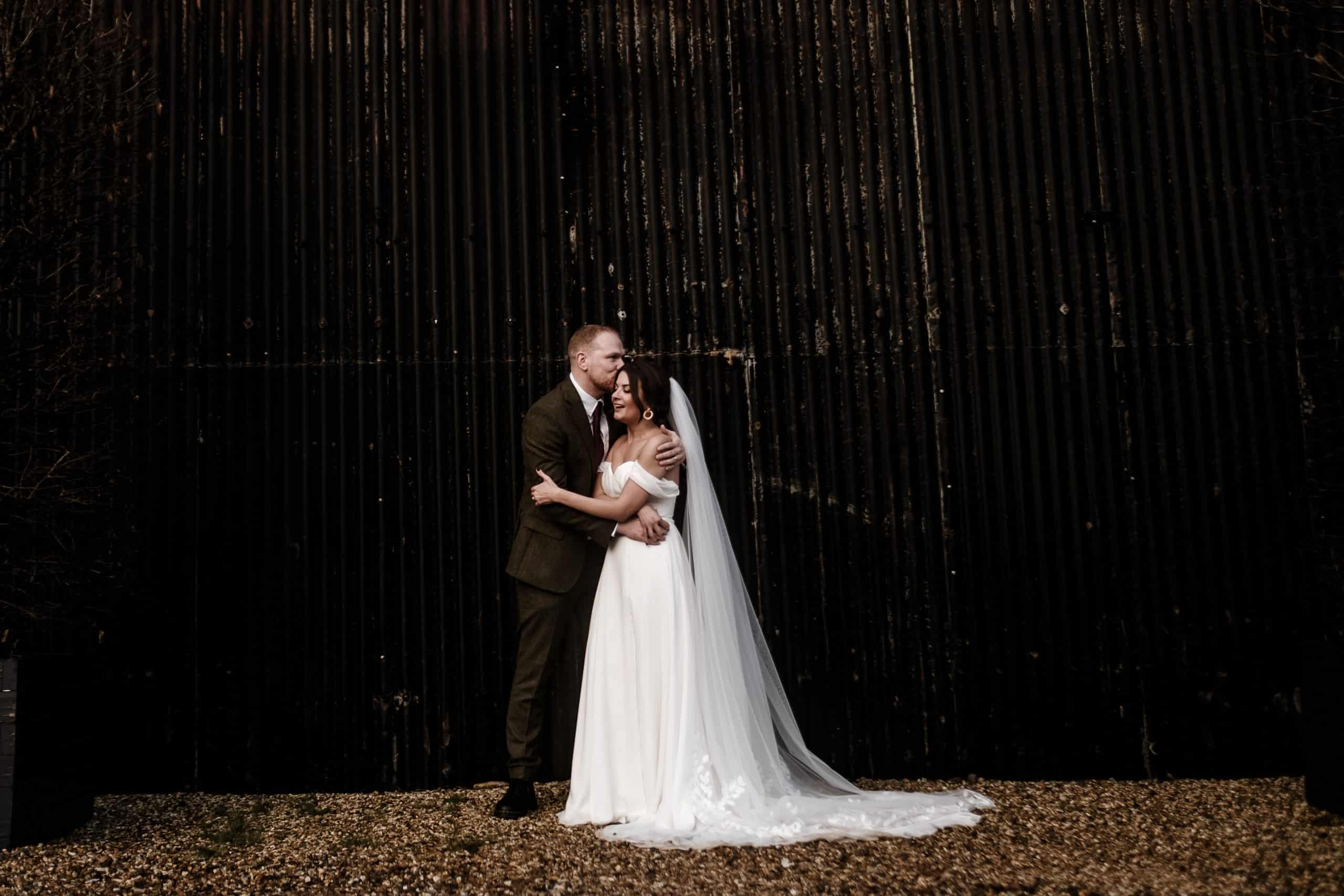 Couples portrait at Cripps barn
