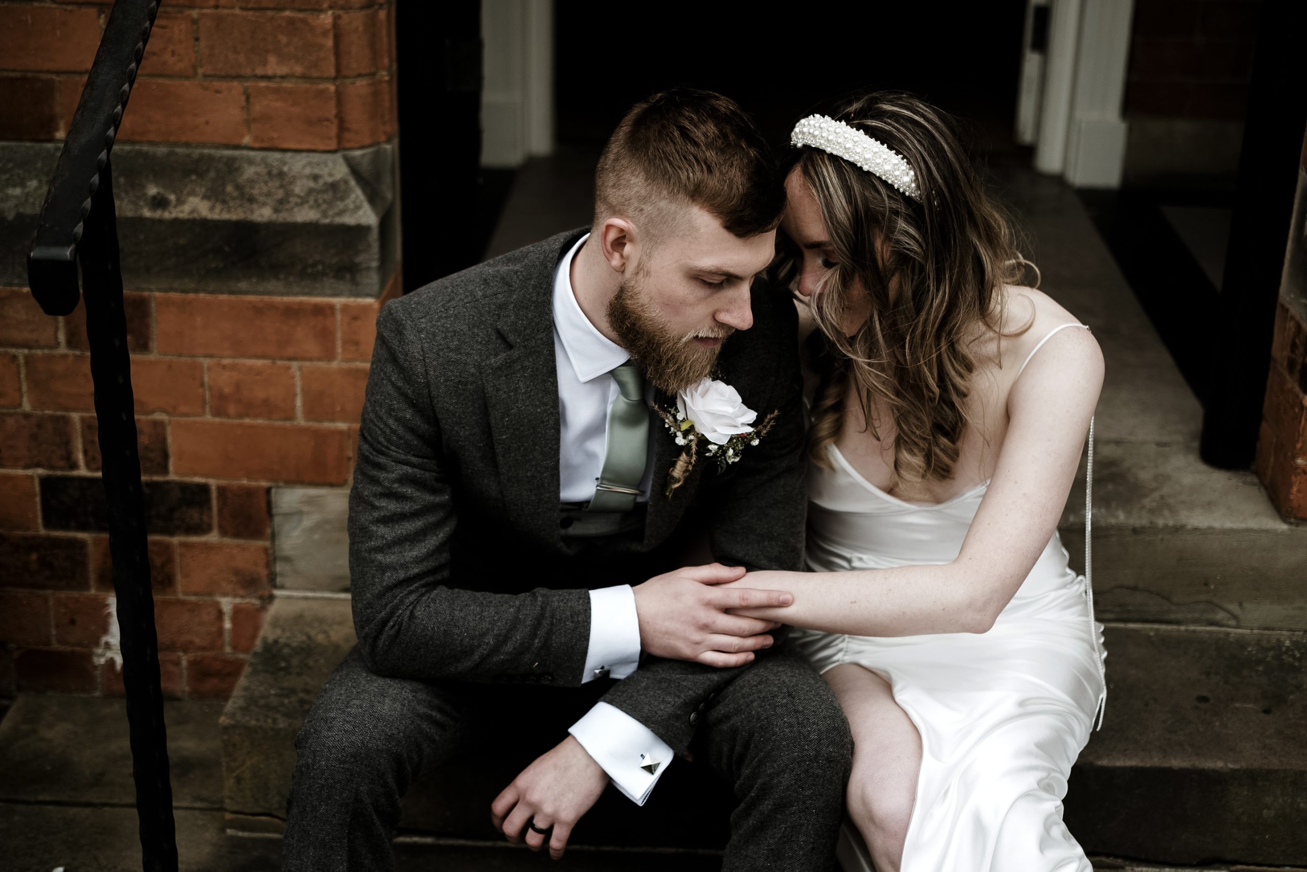 couple photograph on the steps of Kelham House